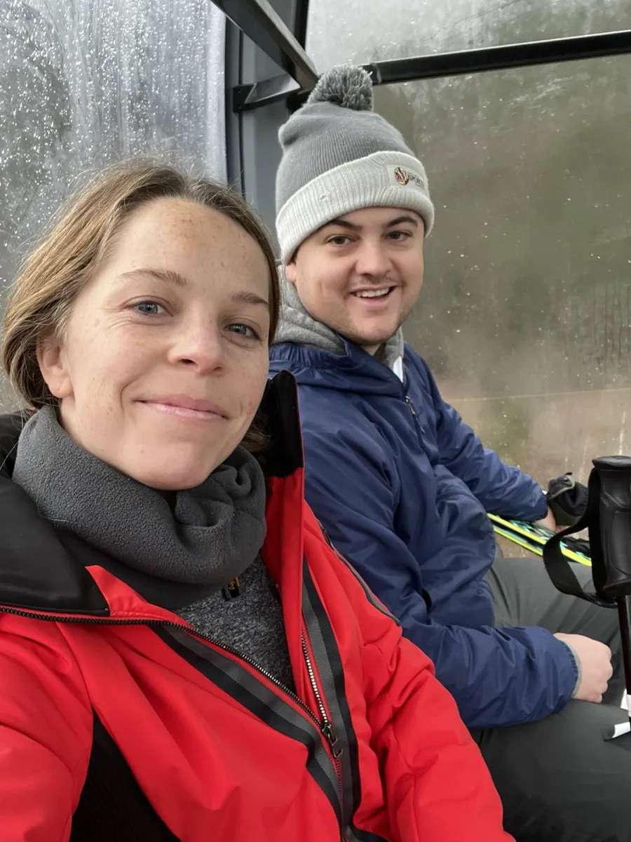 Bundled-up chairlift selfie on a ski day